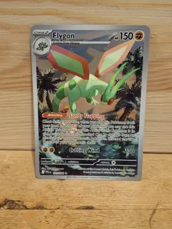 Flygon 101/094 Me02: Phantasmal Flames Holo Illustration Rare Pokemon Card NM - Image 1