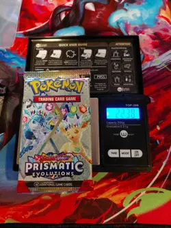 Pokemon Scarlet & Violet Prismatic Evolutions Sealed Booster Weighs 22.38 grams - Image 1
