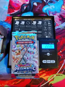 Pokemon Scarlet & Violet Prismatic Evolutions Sealed Booster Weighs 22.36 grams - Image 1