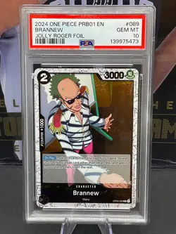 2024 One Piece PRB-01 EN #089 Brannew Jolly Roger Foil PSA 10 GEM MINT - Image 1