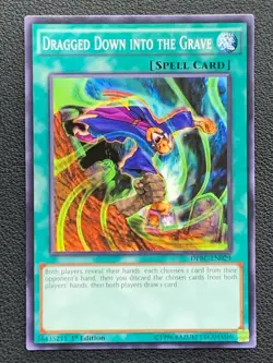 Dragged Down Into The Grave DPBC-EN029 1st Edition Yu-Gi-Oh! - Image 1