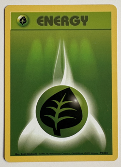 Grass Energy 99/102 Pokemon Card & Top Loader (Base Set) - Image 1