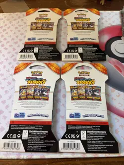 Pokemon TCG Surging Sparks Sleeved pokemon Booster Packs Sealed Lot Of 4. - Image 2