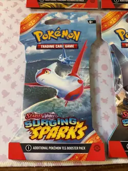Pokemon TCG Surging Sparks Sleeved pokemon Booster Packs Sealed Lot Of 4. - Image 5