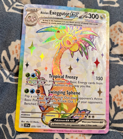 Alolan Exeggutor - Ultra Rare Holo - EX Sv08: Surging Sparks 225/191 - Pokemon - Image 1
