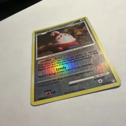 Pokemon TCG Diamond & Pearl Happiny 52/123 Stamped Reverse Holo - Image 5