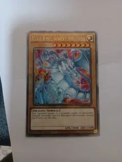 Blue-Eyes White Dragon (New Art) (Quarter Century Secret Rare) RA04-EN002... - Image 1