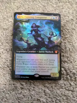 NM Alela, Cunning Conqueror - Foil - Extended Art Commander: Wilds of Eldraine - Image 1
