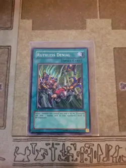 YUGIOH TCG RUTHLESS DENIAL DP04-EN024 SUPER 1ST ED NM - Image 1
