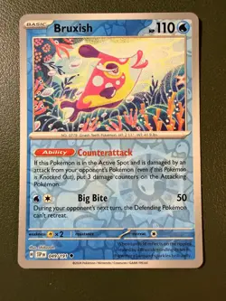 Pokemon TCG Bruxish 49/191 Surging Sparks SV8 Reverse Holo NM - Image 1