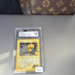 Rocket's Zapdos CGC 10 15/132 Celebrations Classic Collection Holo Pokemon TCG - Image 1