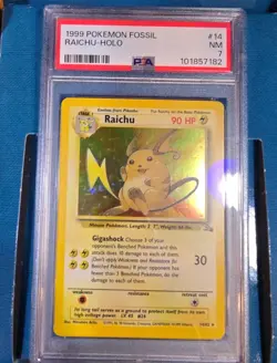 Pokemon Raichu Fossil Holo Rare Unlimited PSA 7 14/62 English Card (1999) - Image 1