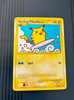 Surfing Pikachu 114/111 Rising Rivals Holo Secret Rare Pokemon - Image 1