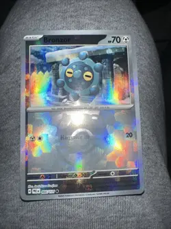 Bronzor 066/131 (Master Ball Pattern) Prismatic Evolutions Pokemon Near Mint - Image 1