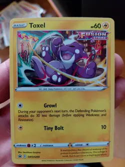 Pokemon TCG SWSH Black Star Promo Toxel #SWSH209 Cosmos Holo - Image 1