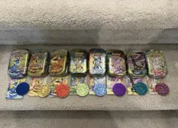 Prismatic Evolutions *EMPTY* Mini Tin Complete Set Of 8 (Tin + Card + Coin) - Image 1