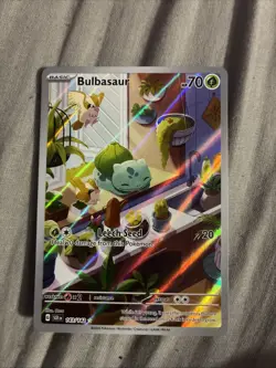 Pokemon TCG Bulbasaur Card StellarCrown Card 143/142 up lift on the back corners - Image 1