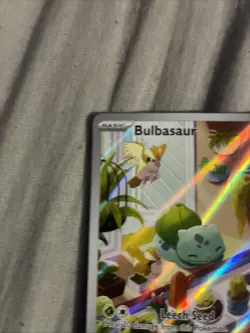 Pokemon TCG Bulbasaur Card StellarCrown Card 143/142 up lift on the back corners - Image 2