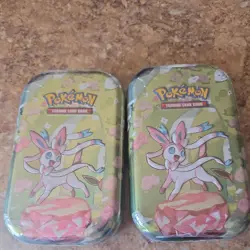 POKEMON SCARLET & VIOLET PRISMATIC EVOLUTIONS MINI TIN-NEW & SEALED Set Of 2 - Image 1