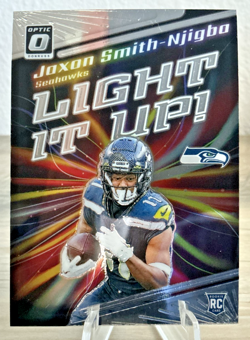 2023 Donruss Optic Light it Up Jaxon Smith-Njigba #LU-JSN Seahawks - Image 1