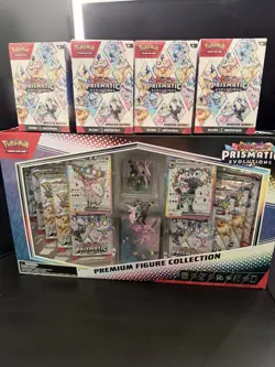 Pokemon prismatic Evolution premium Figure Collection and 4x booster bundles - Image 1