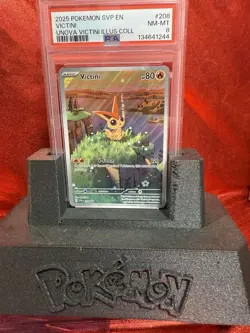 2025 Pokemon SVP Victini #208 Black Star Promo PSA 8 – Illustration - Image 3