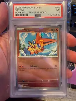 2025 Pokemon Black Bolt #012 Victini Poke Ball Reverse Holo PSA 7 - Image 1