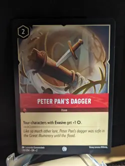 Disney Lorcana: Floodborn - Peter Pan’s Dagger - #135/204 Common - NON Foil - Image 1