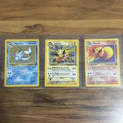 1999 Pokemon Flareon #3/64, Jolteon #4/64, Vaporeon #12/64 Jungle Holo Trio - Image 1