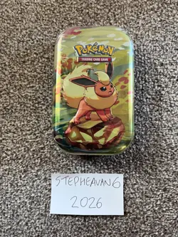 Pokemon TCG: Scarlet & Violet—Prismatic Evolutions Mini Tin New Sealed - Flareon - Image 1