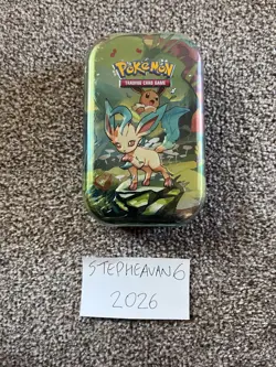 Pokemon TCG: Scarlet & Violet—Prismatic Evolutions Mini Tin New Sealed - Leafeon - Image 1