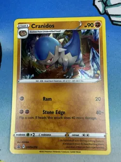 Cranidos SWSH274 Black Star Promo Cosmos Holo Pokemon Card - Image 1