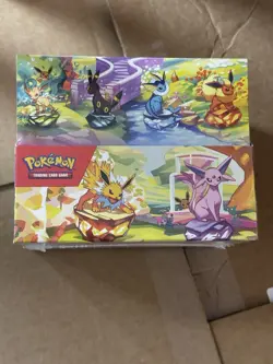 Pokemon TCG Prismatic Evolutions Mini-Tin Display (8 Tins) – Factory Sealed - Image 1