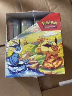 Pokemon TCG Prismatic Evolutions Mini-Tin Display (8 Tins) – Factory Sealed - Image 4