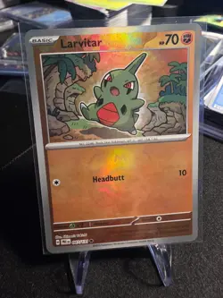 Pokemon Larvitar 047/131 Sv: Prismatic Evolutions Masterball - Image 1