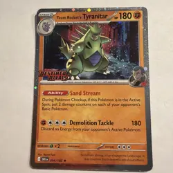 Pokemon Destined Rivals Team Rocket Tyranitar Stamped Promo 96 /182 - Image 1