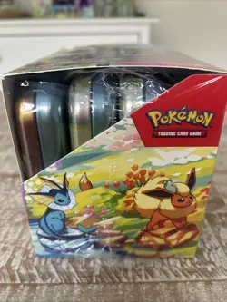 Pokemon TCG Prismatic Evolutions Mini Tin Display Case | 8 Tins / Factory Sealed - Image 4
