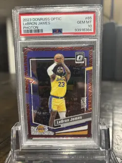 PSA 10 2023 Donruss Optic 65 LEBRON JAMES PHOTON SSP CASE HIT🥵🔥🔥 - Image 1