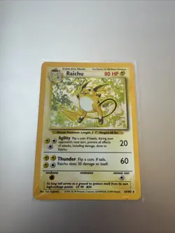 Pokemon TCG Raichu Holo Rare Card 14/102 1999 Vintage MP Base Set WOTC - Image 1