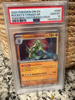 PSA 10 Rocket’s Tyranitar #096 2025 Pokemon Center Exclusive Team Rocket GEM MIN - Image 1