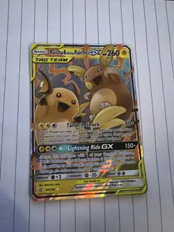 Pokemon TCG Raichu and Alolan Raichu GX Tag Team 54/236 - Image 1