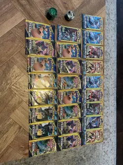 25 Pokemon Sun And Moon 3 Card Booster Packs + 25 Coins - Image 1