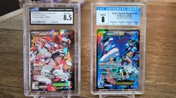 Team Magma's Groudon X Team Aqua's Kyogre - Pokemon Double Crisis - CGC 8, 8.5 - Image 1
