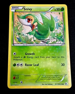 Snivy RC1/RC25 NM Legendary Treasures: Radiant Collection Holo Pokemon Card - Image 1