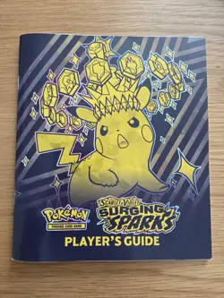 POKEMON TCG SURGING SPARKS ETB PLAYERS GUIDE BOOKLET - Image 1
