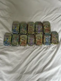 Pokemon Lot De 12 Mini Tins Evolution Prismatique EV8.5 - Neuf/Scelle - FR - Image 1