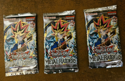 Set of 3 sealed Yugioh Metal Raiders card packs - Image 1