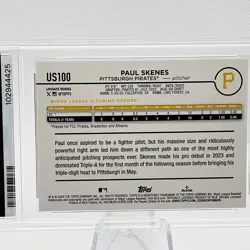 2024 Topps Update Series Paul Skenes #US100 Rainbow Foil White uniform RC PSA 8 - Image 2