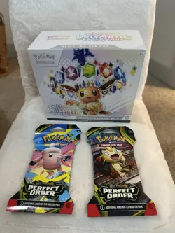 Pokemon TCG Scarlet & Violet Prismatic Evolutions ETB + 2 Booster Packs - Image 1