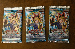 Set of 3 sealed Yugioh Blue Eyes White Dragon card packs - Image 1